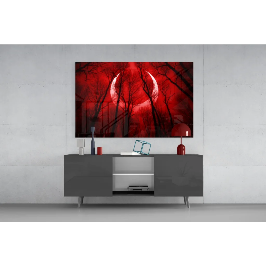 Stunning red moon glass wall art with black tree silhouettes