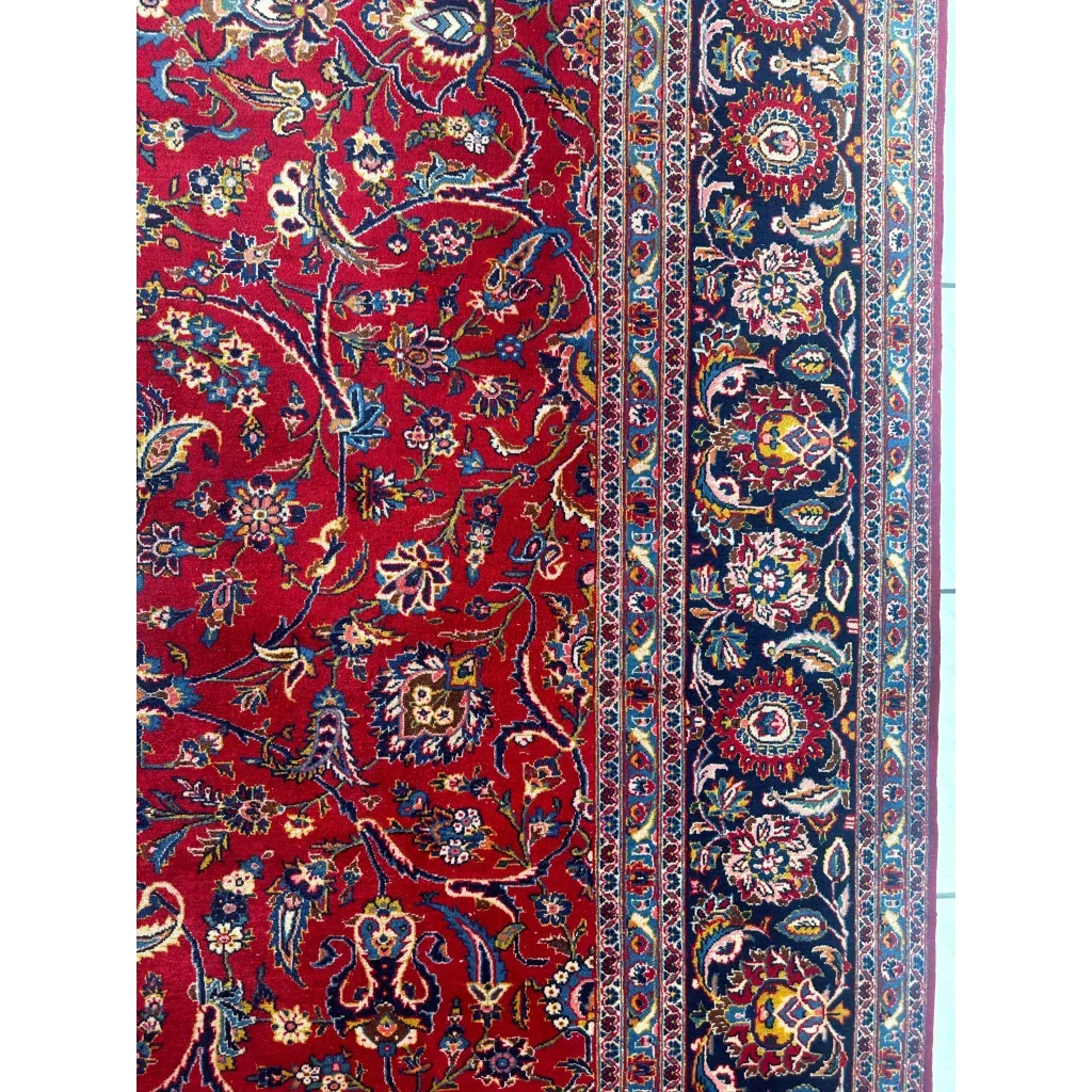 Stunning red Persian rug with intricate floral and paisley patterns