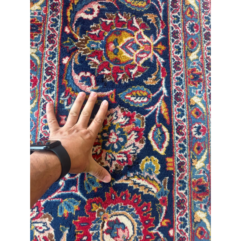 Stunning red Persian rug with intricate floral and geometric patterns