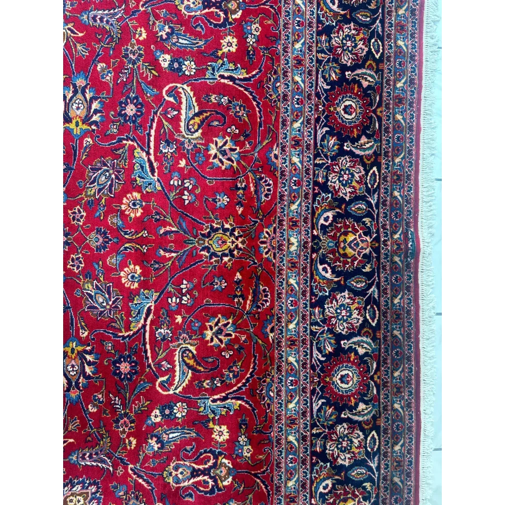 Stunning red Persian rug with intricate floral and paisley patterns