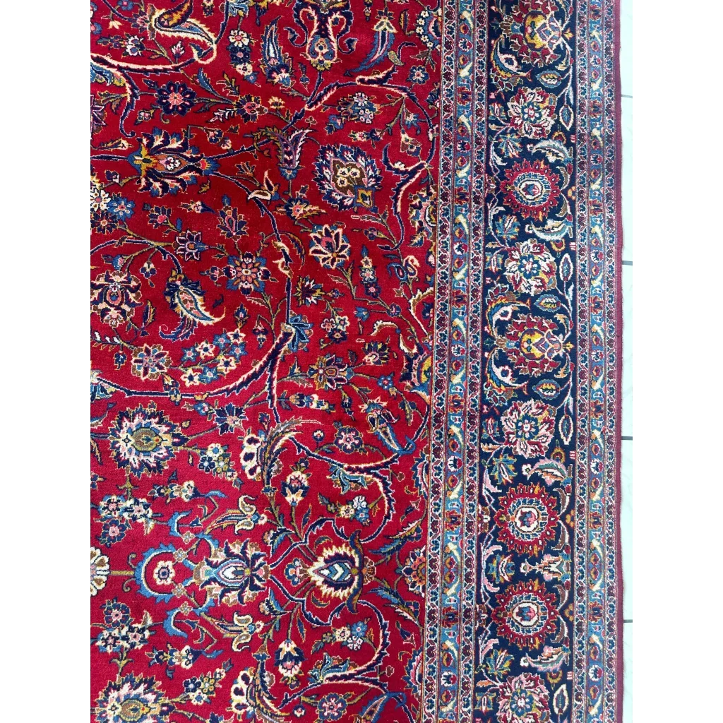 Stunning red Persian rug with intricate floral and paisley patterns
