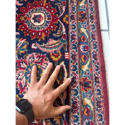 Stunning red Persian rug with intricate floral patterns