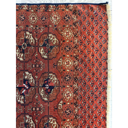 Stunning red Turkmen Persian rug with geometric florals