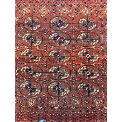 Stunning red Turkmen Persian rug with geometric floral motifs