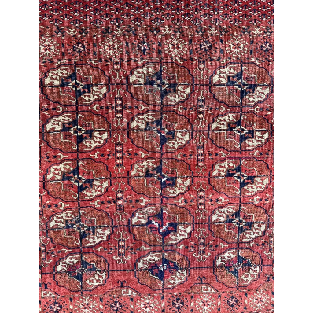 Stunning red Turkmen Persian rug with intricate geometric florals