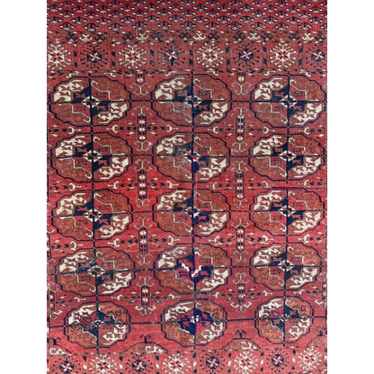 Stunning red Turkmen Persian rug with intricate geometric florals