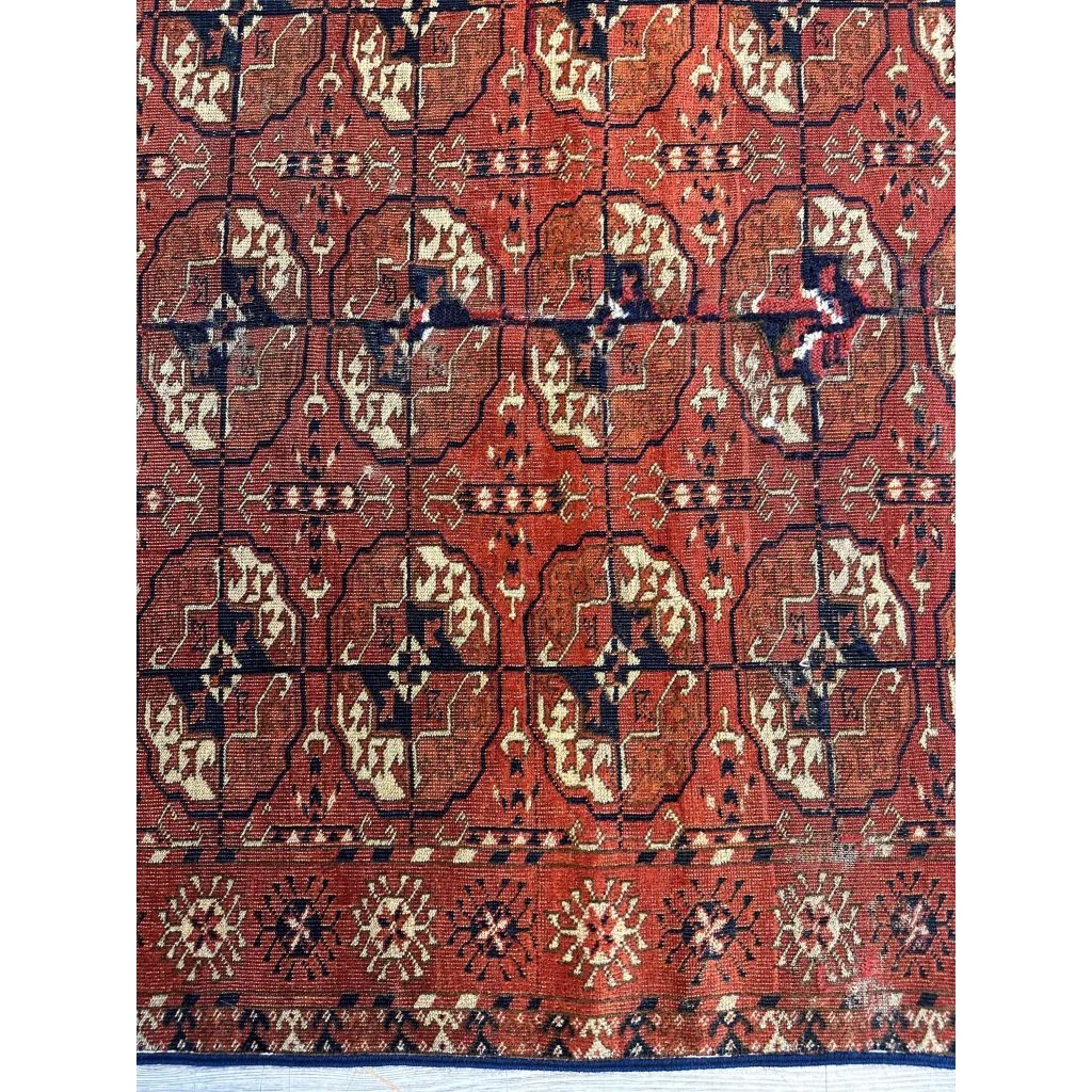 Stunning red Turkmen Persian rug with geometric floral motifs