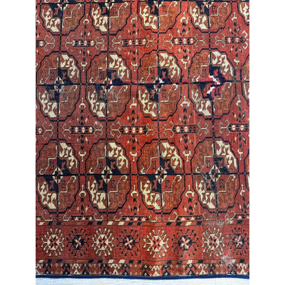 Stunning red Turkmen Persian rug with geometric floral motifs