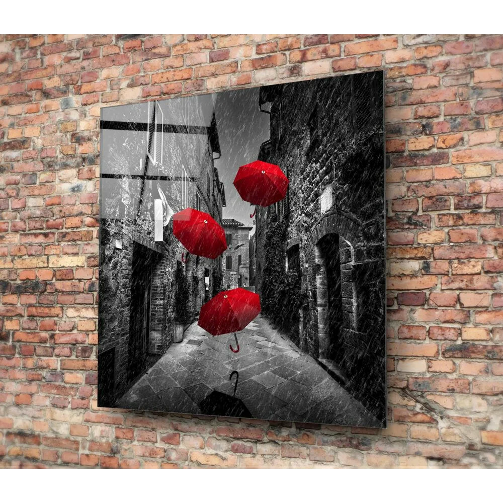 Stunning red umbrella glass wall art print with black and white background