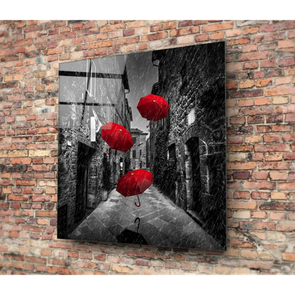 Stunning red umbrella glass wall art print with black and white background
