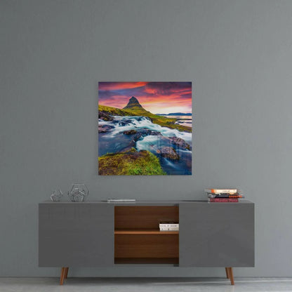 Vibrant glass wall art on modern gray sideboard with wooden legs