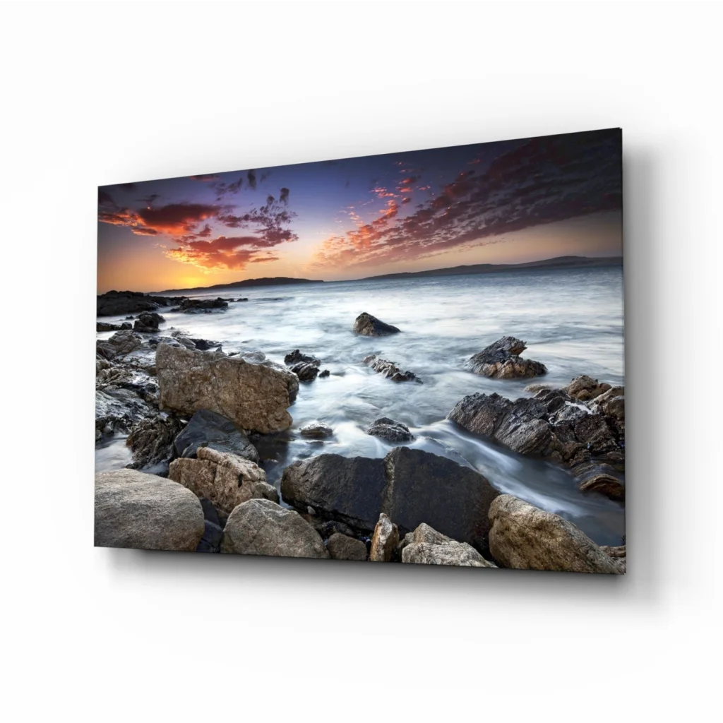 Vibrant rocky beach sunset canvas wall art with orange waves