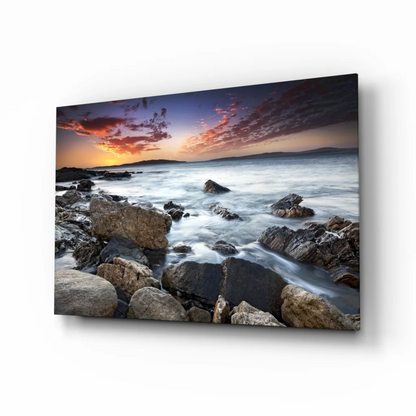 Vibrant rocky beach sunset canvas wall art with orange waves