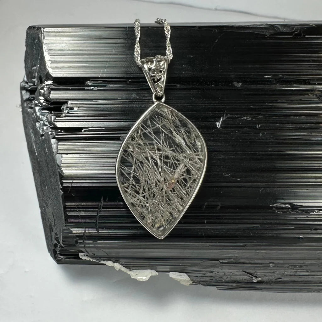 Stunning rutilated quartz teardrop pendant in sterling silver