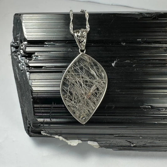 Stunning rutilated quartz teardrop pendant in sterling silver
