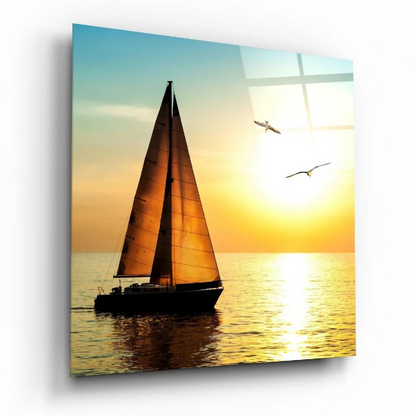 Stunning sailboat glass wall art with vibrant yellow sunset sails