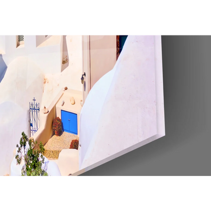 Vibrant blue door in whitewashed stone walls, Santorini glass wall art print