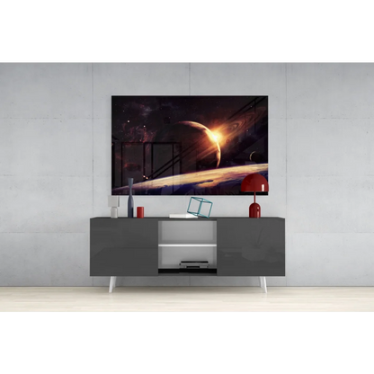 Samsung QLED TV with sleek black frame and vibrant Saturn galaxy wall art