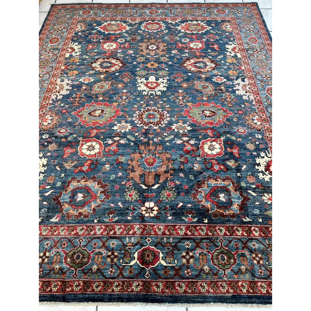 Stunning Serapi transitional rug with intricate floral patterns in deep blue
