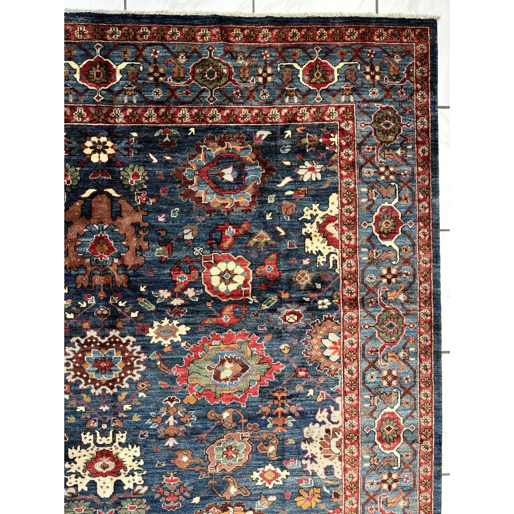 Deep blue Serapi transitional rug with intricate floral patterns in ghazni wool