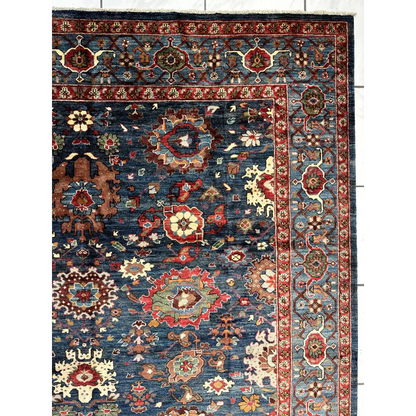 Deep blue Serapi transitional rug with intricate floral patterns in ghazni wool