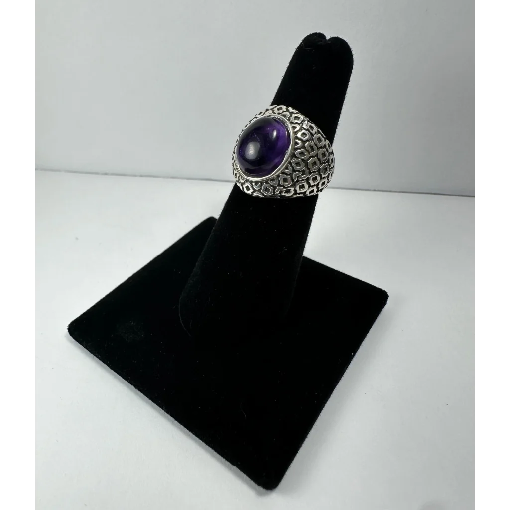 Stunning silver amethyst ring with purple cabochon and geometric design