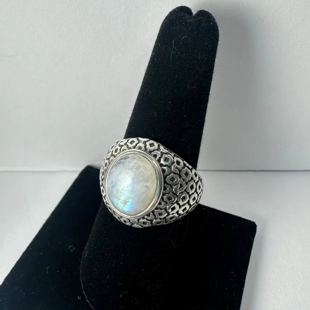 Stunning silver moonstone ring with oval gem and geometric band
