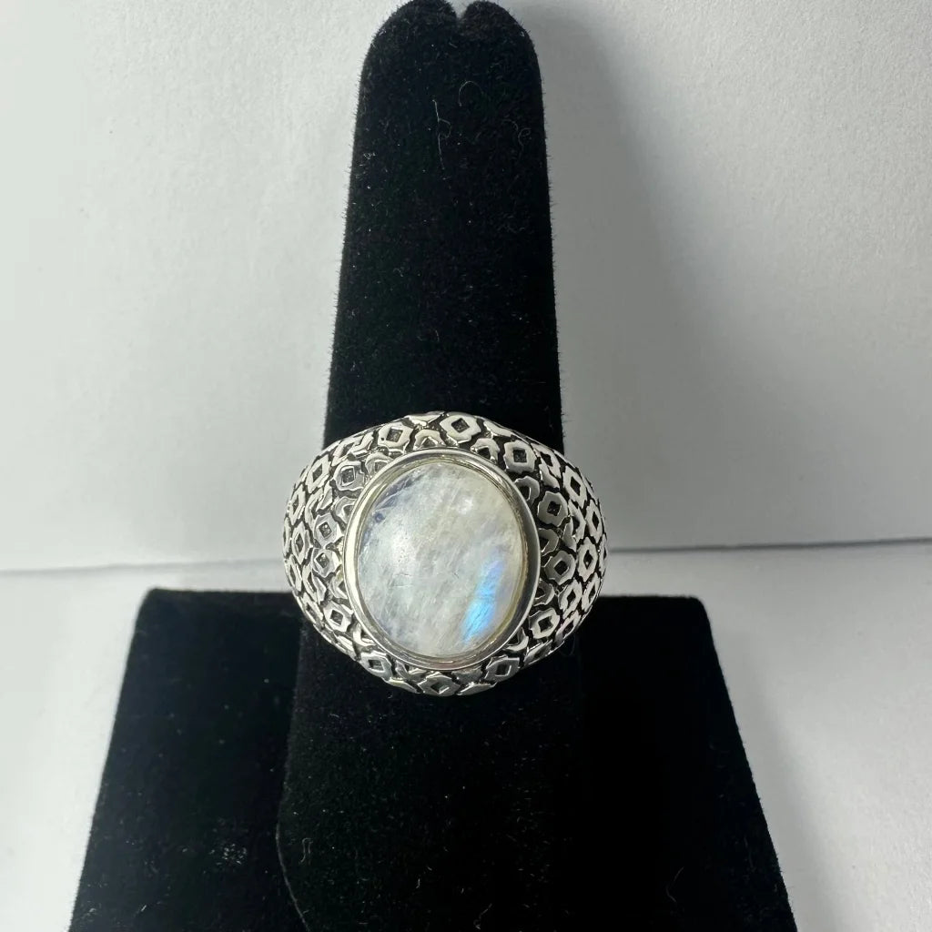 Stunning silver moonstone ring with oval iridescent gem and geometric band