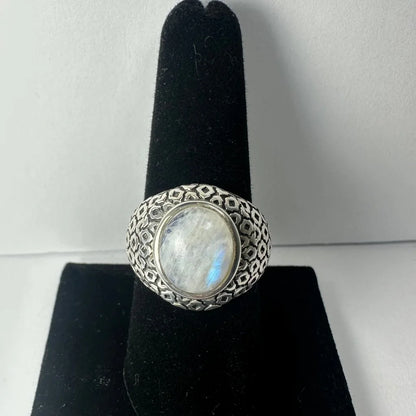 Stunning silver moonstone ring with oval iridescent gem and geometric band