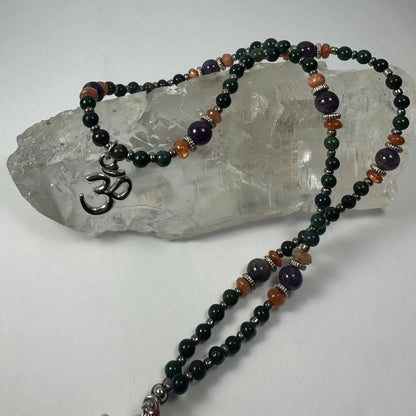 Stunning silver om pendant mala with amethyst beads in green, purple, orange