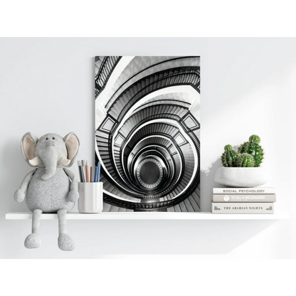 Black and white spiral staircase canvas wall art print on glossy textured paper
