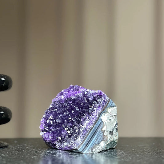 Vibrant standing amethyst geode with sparkling purple crystals