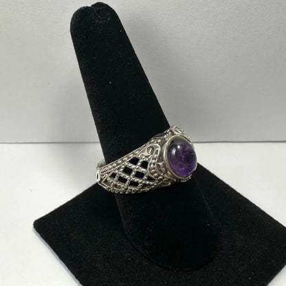 Stunning silver amethyst ring with filigree band and oval purple stone