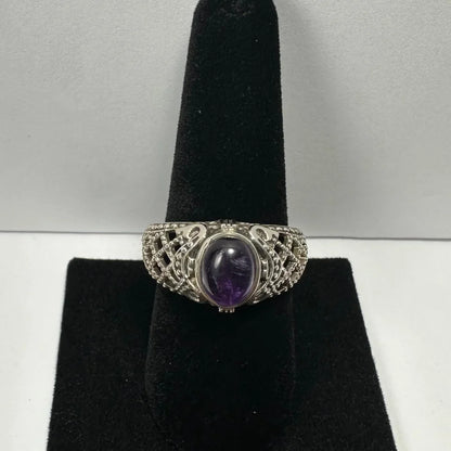 Stunning silver amethyst ring with filigree band and oval purple gem