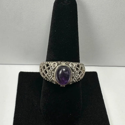 Stunning silver amethyst ring with filigree band and oval purple gem
