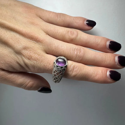 Stunning silver amethyst ring with oval stone and filigree band