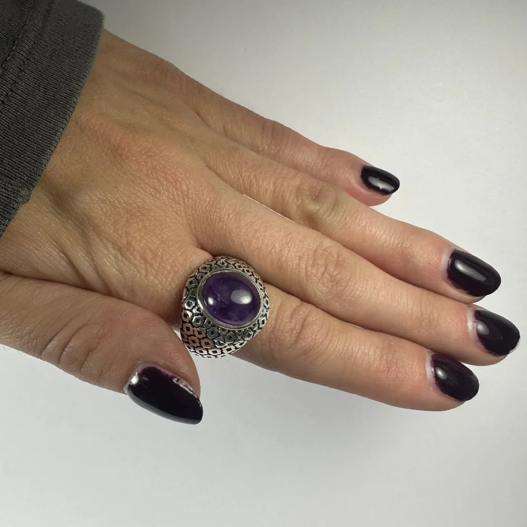 Stunning silver amethyst ring with oval stone and geometric openwork design