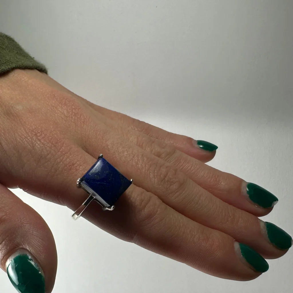 Stunning lapis lazuli ring with square-cut deep blue stone in silver band