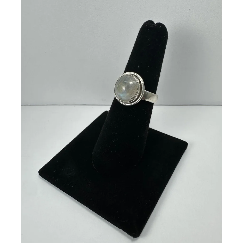 Stunning sterling silver moonstone ring with bezel-set oval gem