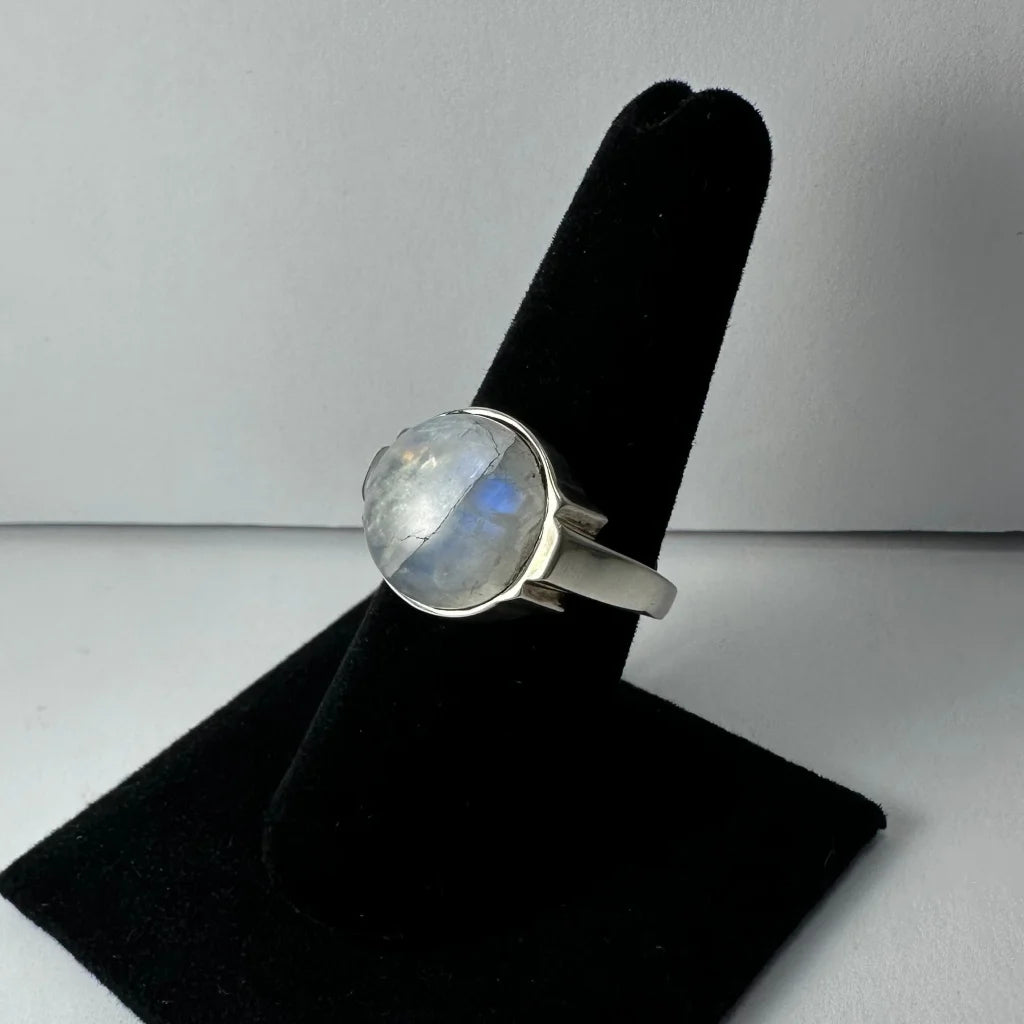 Stunning silver moonstone ring with iridescent blue glow