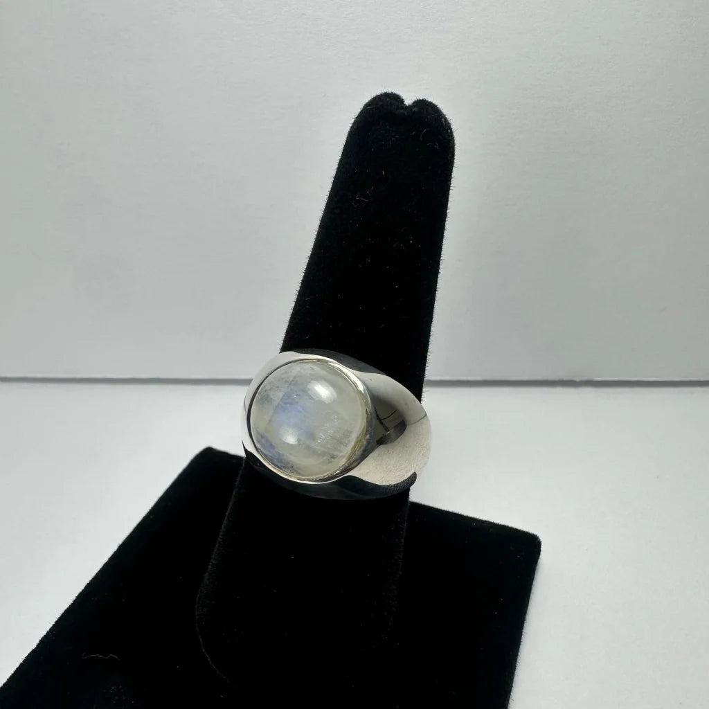 Sleek sterling silver moonstone ring with iridescent glow