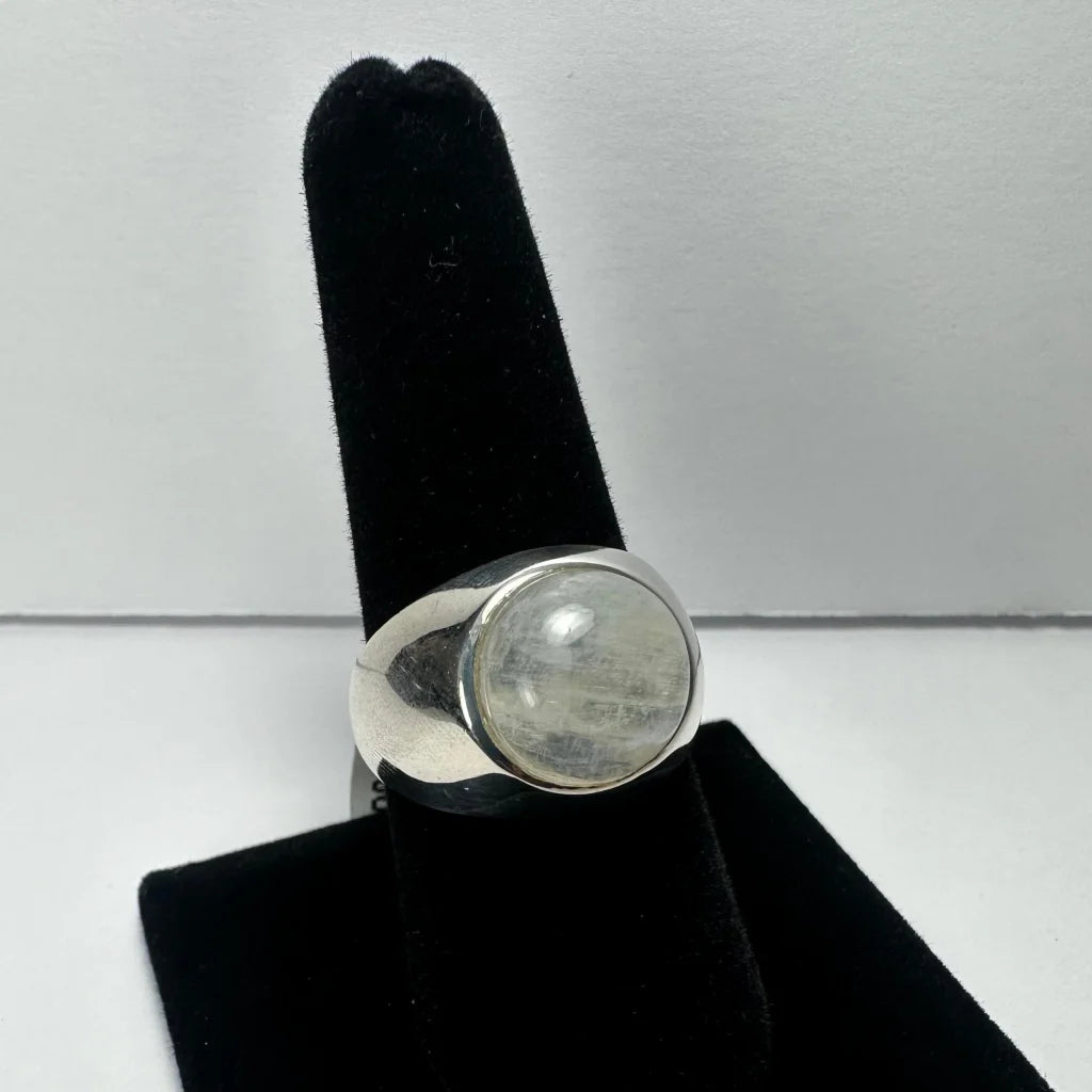 Sleek sterling silver moonstone ring with iridescent glow