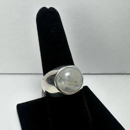 Sleek sterling silver moonstone ring with iridescent glow