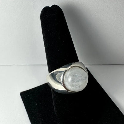 Sleek sterling silver moonstone ring with iridescent glow