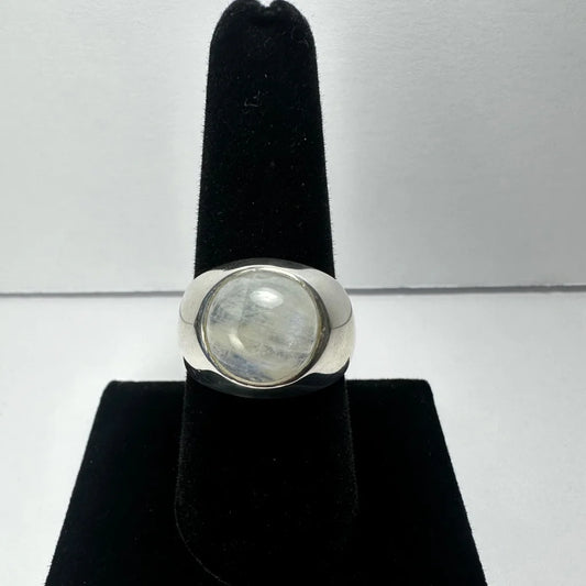 Sleek sterling silver moonstone ring with iridescent oval glow