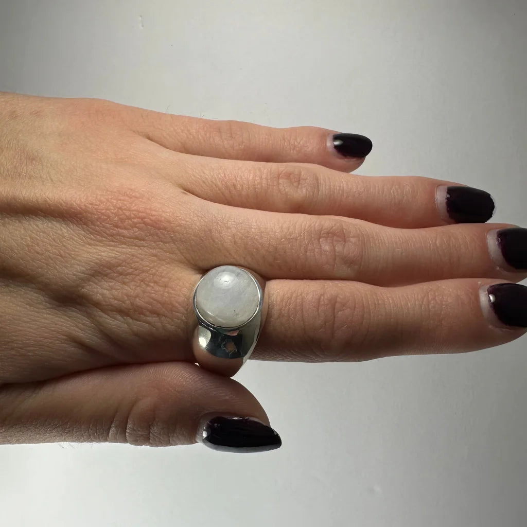 Sleek sterling silver moonstone ring with iridescent glow
