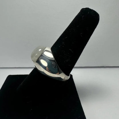Sleek silver moonstone ring with iridescent glow