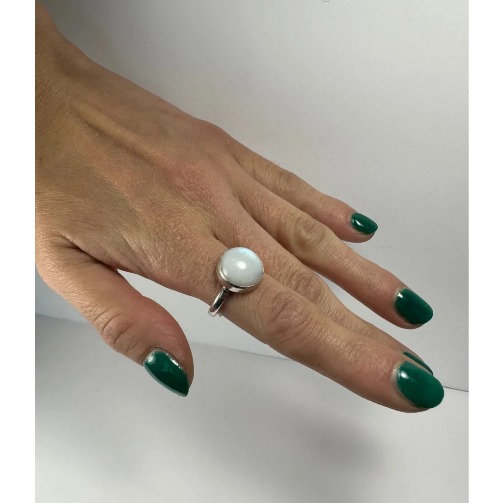 Sleek silver moonstone ring with luminous white stone in minimalist band