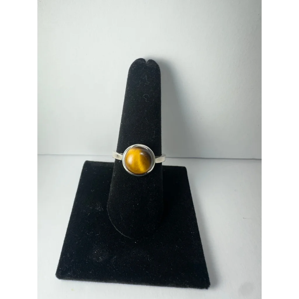 Stunning silver tiger eye ring with golden stone in bezel