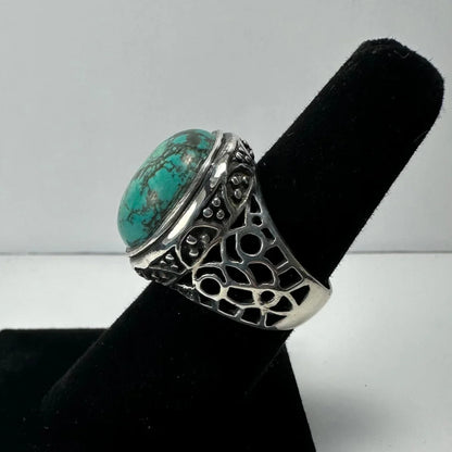 Stunning turquoise ring with silver filigree and natural matrix